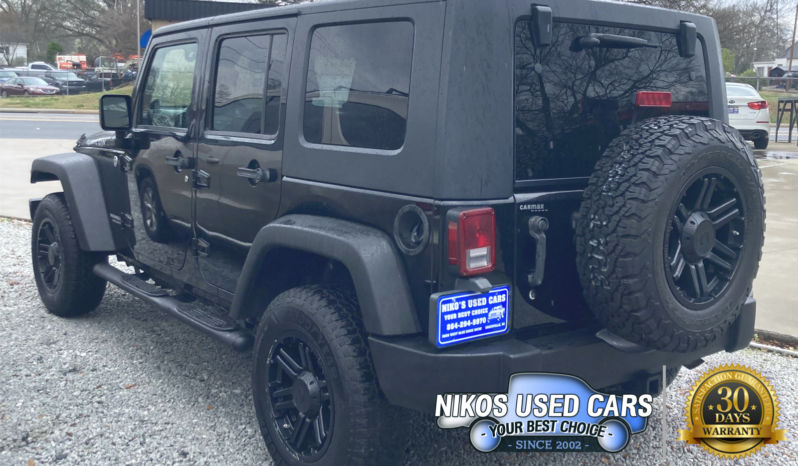 Jeep Wrangler Unlimited Rubicon, Black Clearcoat/Black Soft Top, 2009 full